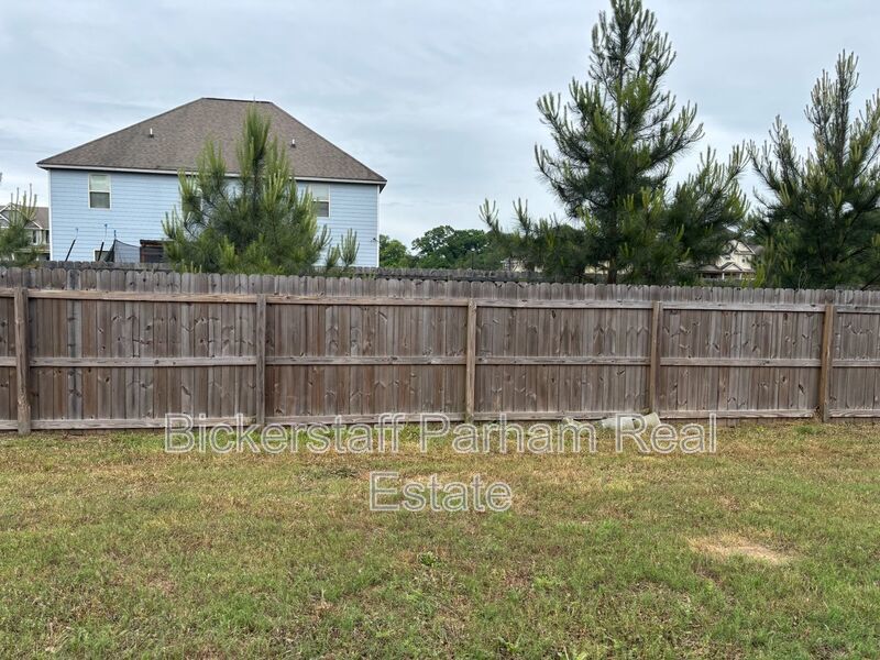 This property blends ample living space and storage with functional amenities. property image