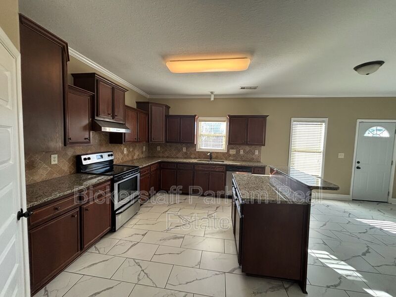 This property blends ample living space and storage with functional amenities. property image