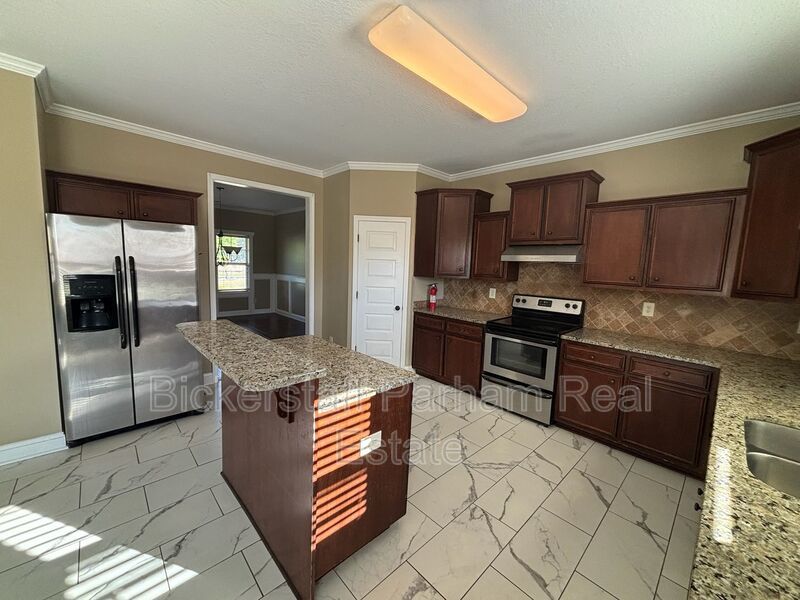 This property blends ample living space and storage with functional amenities. property image