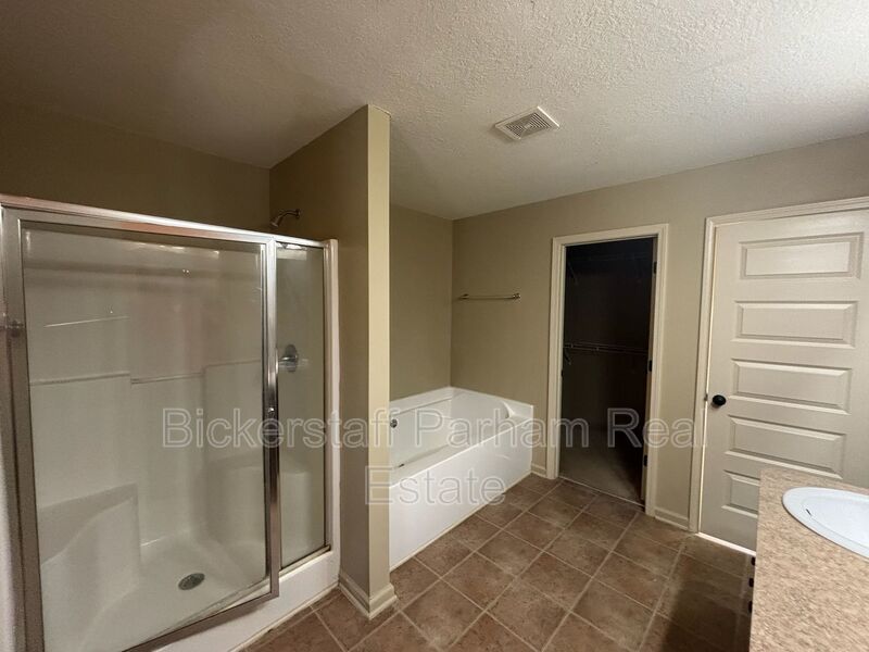 This property blends ample living space and storage with functional amenities. property image