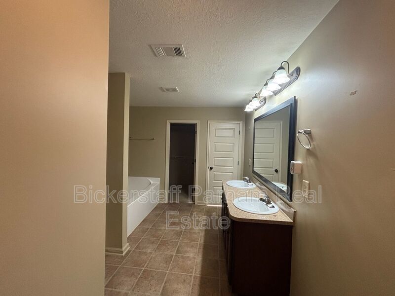This property blends ample living space and storage with functional amenities. property image